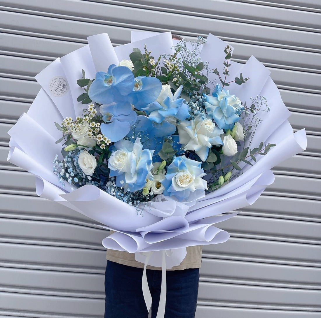 Graduation Bouquet with blue cut phalaenopsis - ROSE &amp; CO